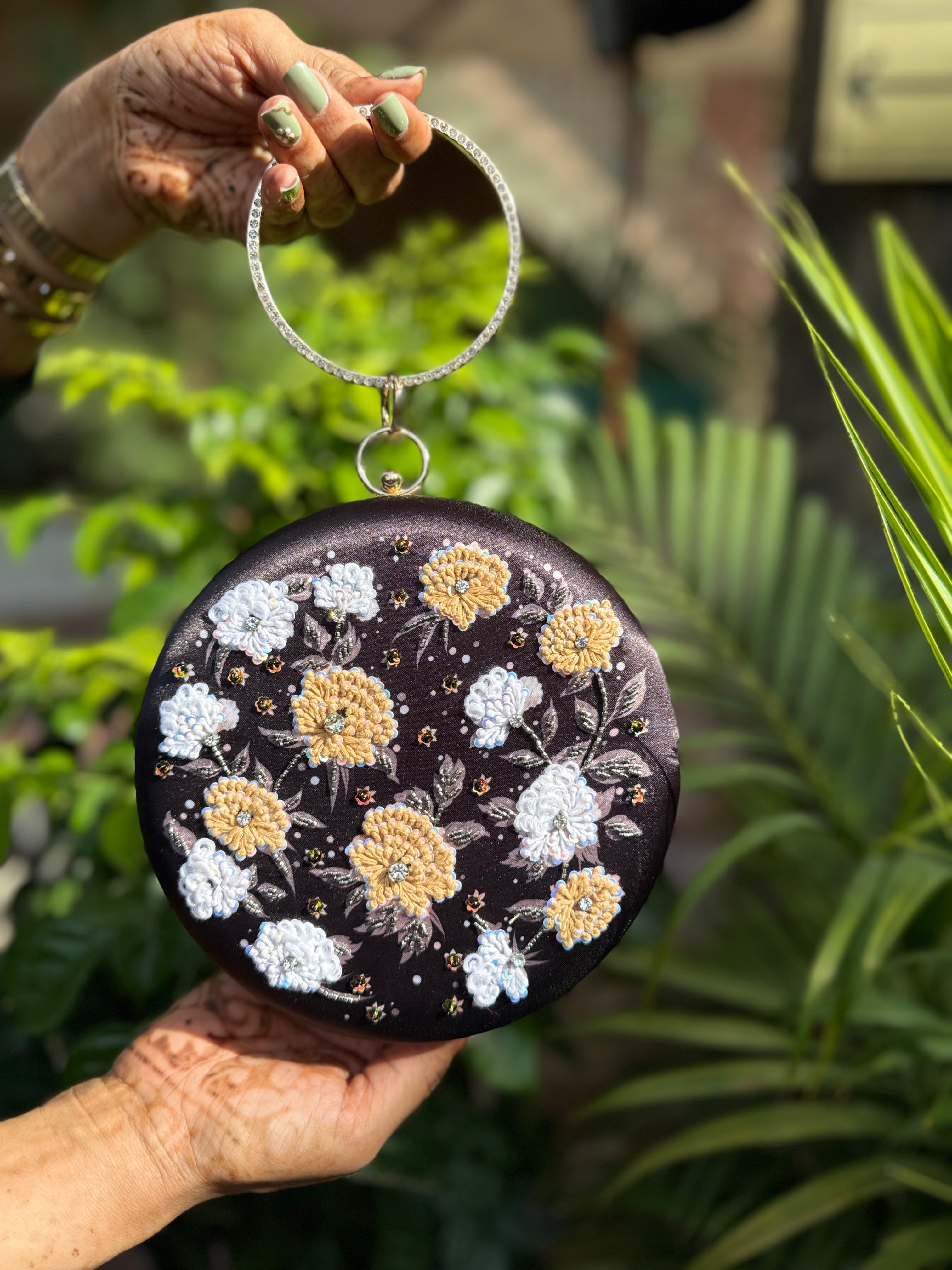 Circular Charm Digital Clutch