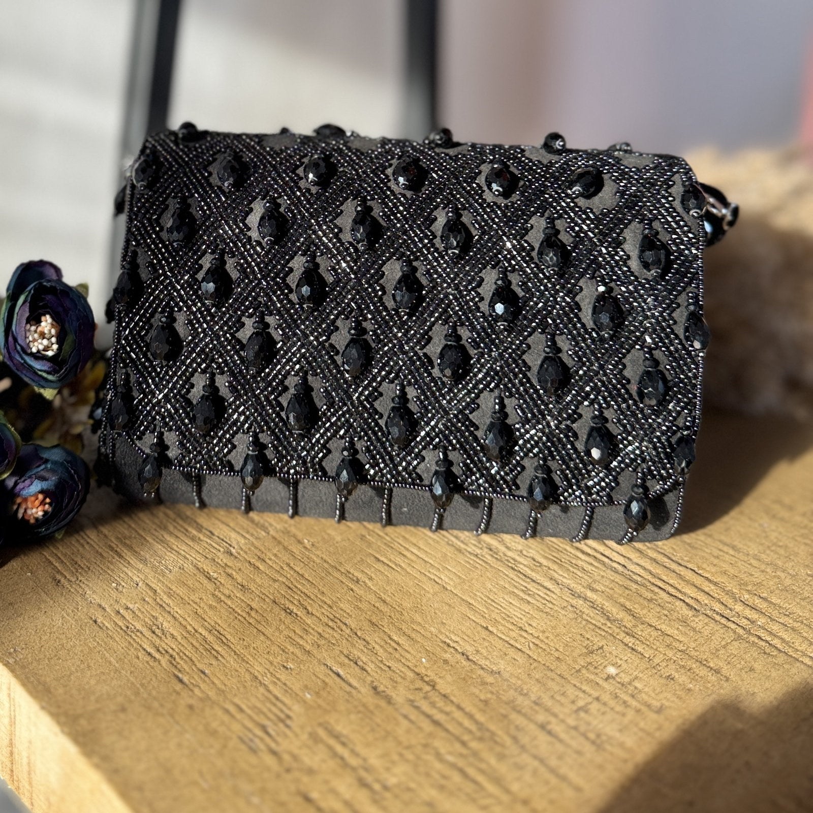 Side angle view of the Ahana bag showcasing its lightweight profile and strap connections.