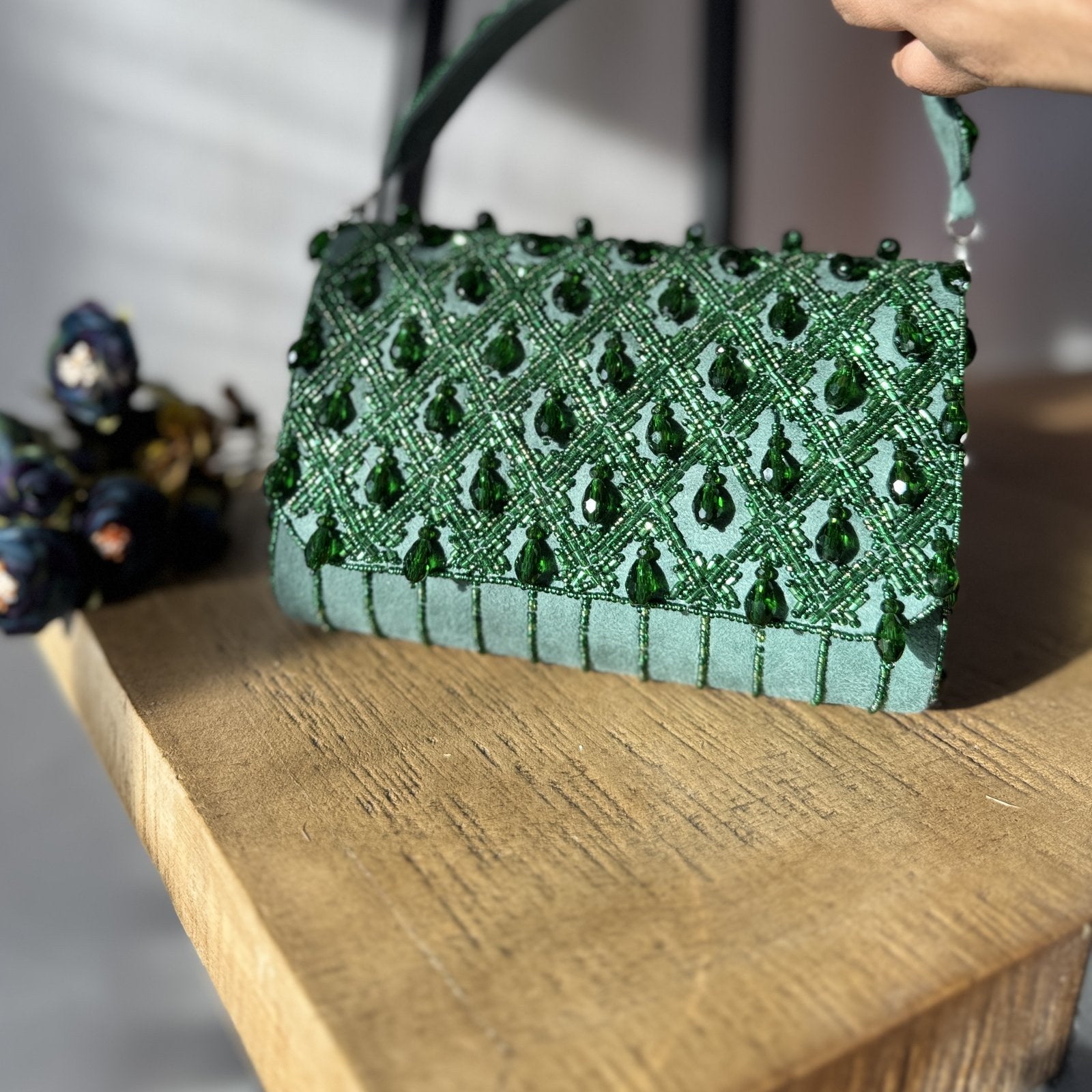 Rear panel view of the Ahana bag showcasing its smooth, pocketless design.