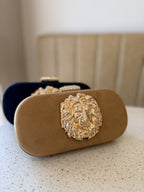 Front view of the Aurelia clutch, illustrating its structured rectangular silhouette.