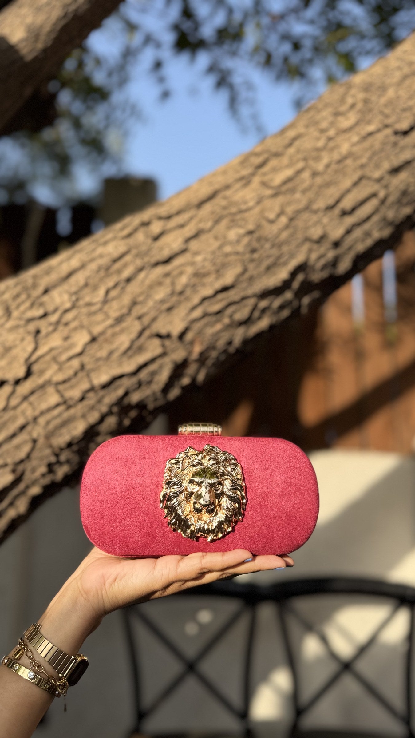 Aurelia clutch in classic silver, illustrating its cool metallic luster.