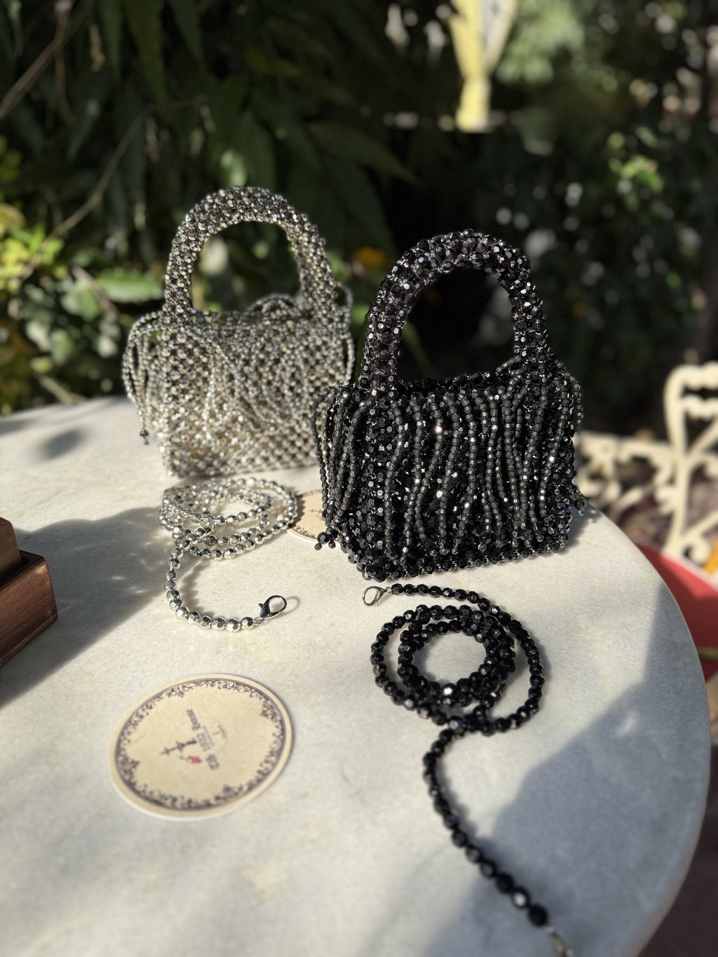 Detailed close-up of the hand-stitched beads, showing the intricate structural patterns.