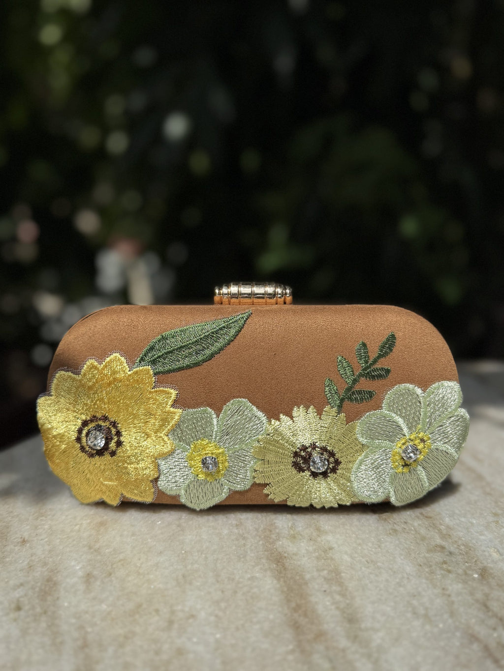 Rear view of the Bloom Box bag showing the consistent coverage of embroidery on the back.