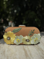 Rear view of the Bloom Box bag showing the consistent coverage of embroidery on the back.
