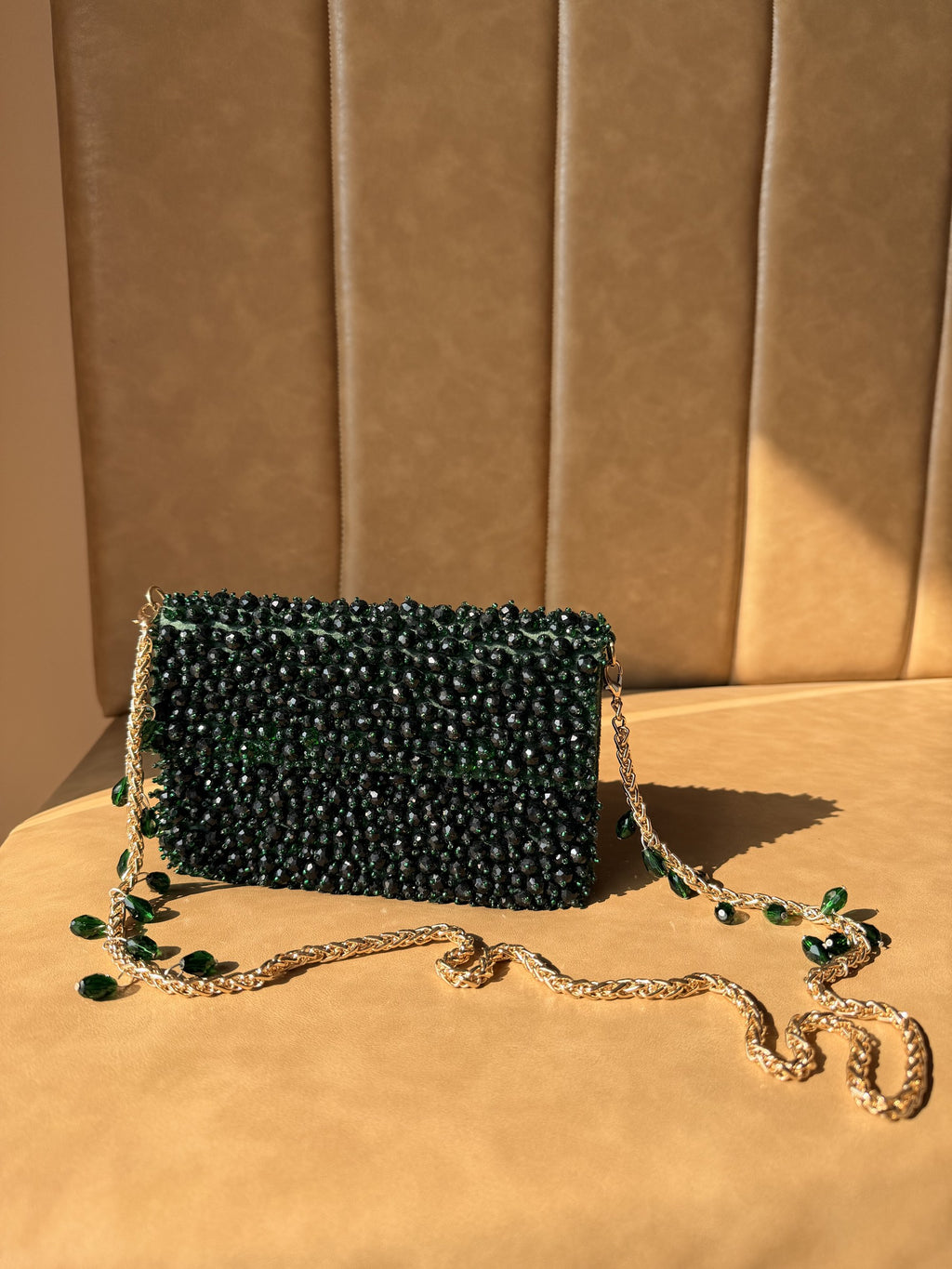 Detailed close-up of the imitation pearls and glass beadwork on the Celebration Capsule.