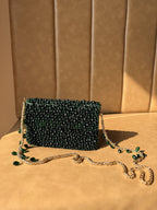 Detailed close-up of the imitation pearls and glass beadwork on the Celebration Capsule.