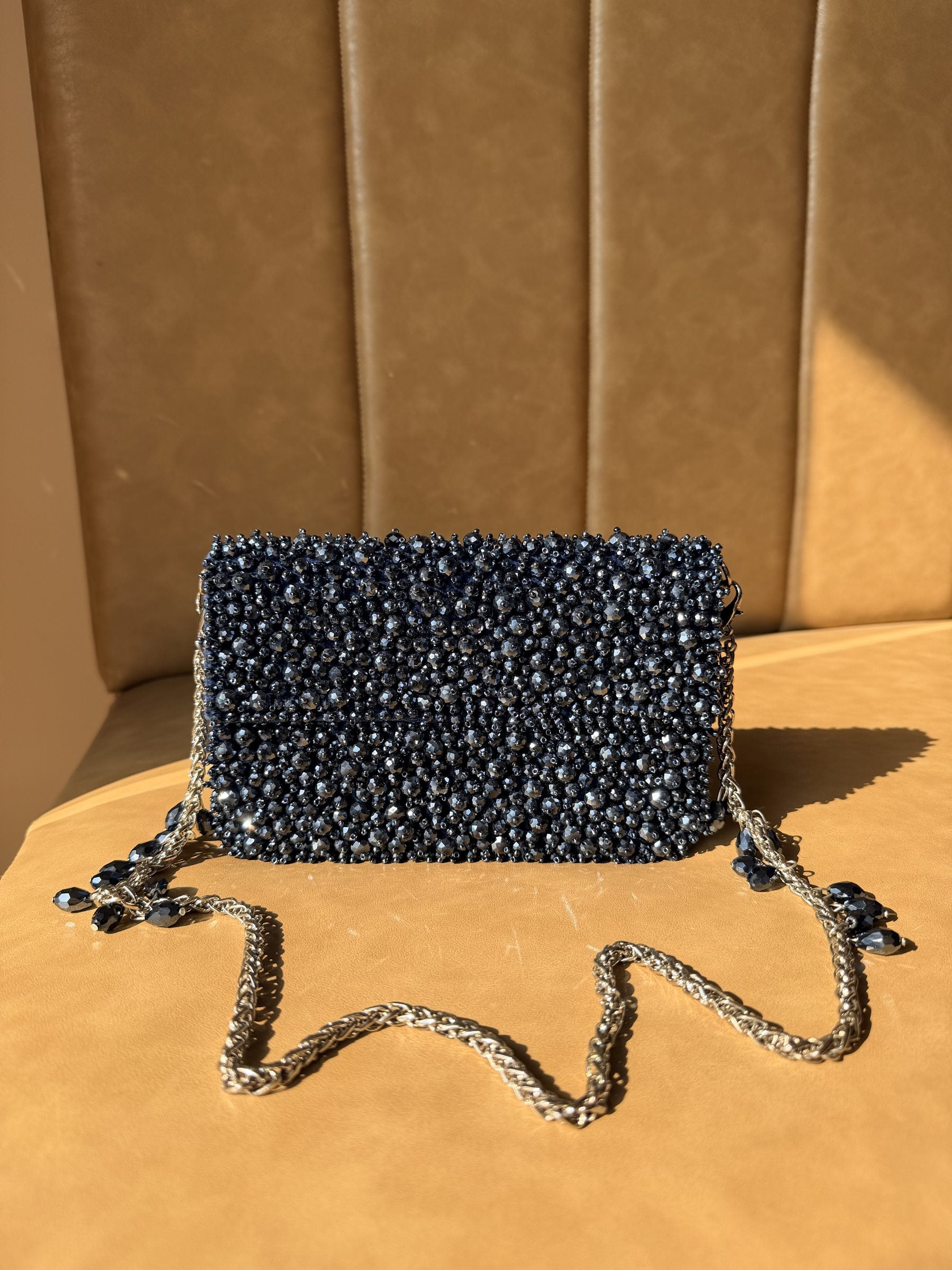 The Celebration Capsule clutch styled with a luxury pastel wedding gown.