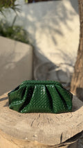 Criss Cross bag styled on an outfit, illustrating its crossbody functionality.