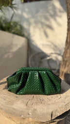 Criss Cross bag styled on an outfit, illustrating its crossbody functionality.