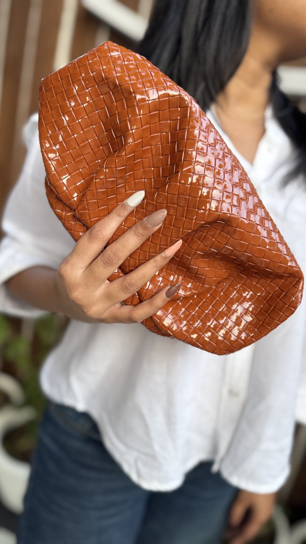 Detailed weave pattern highlighting the red and green threadwork.