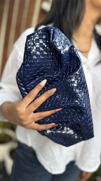 Side profile view of the bag showing its soft depth.