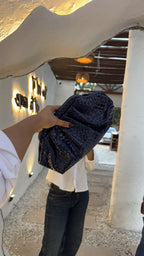 Model styling the bag as a high-shoulder carry.