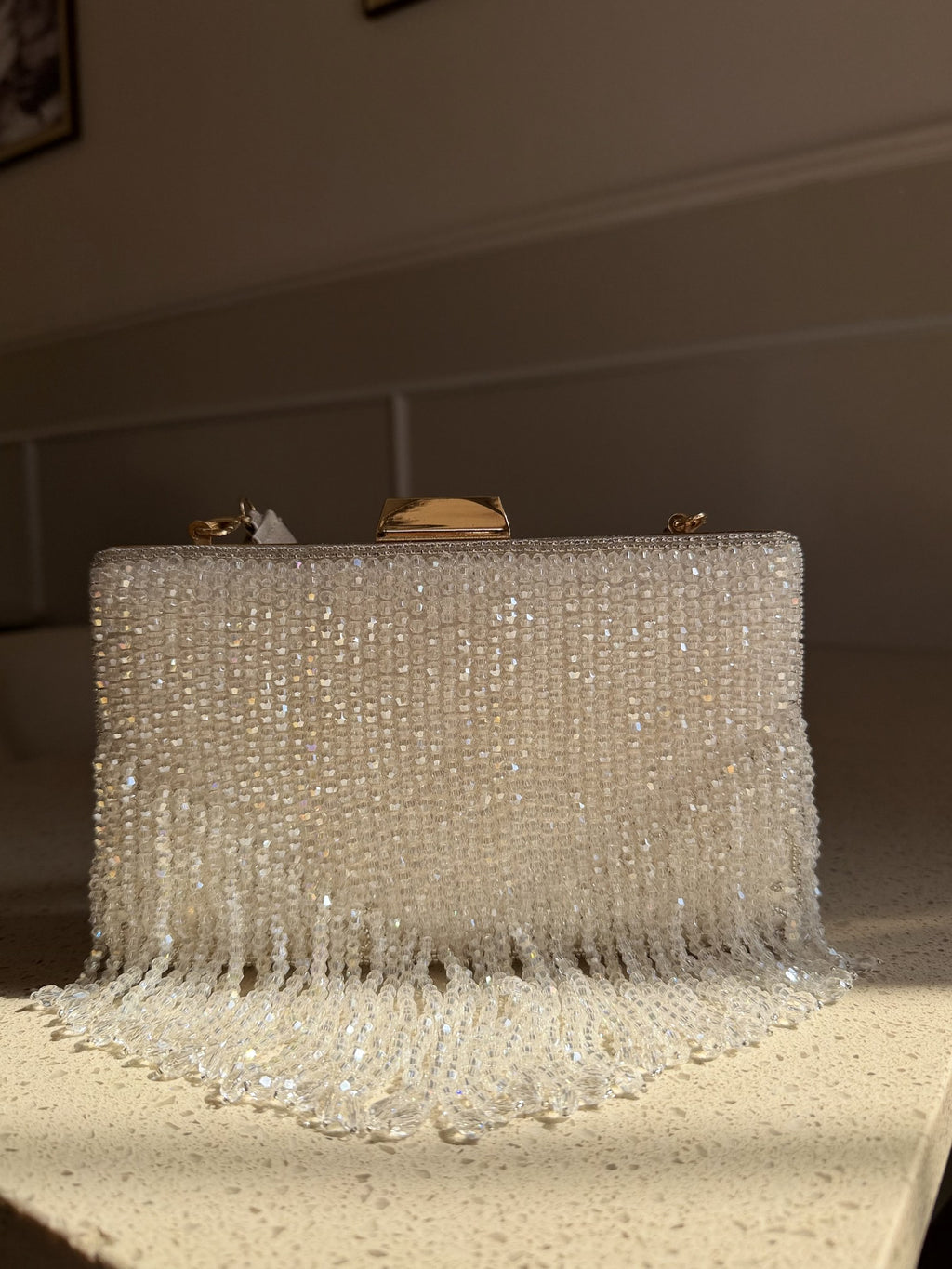 Front view of the Crystal Fringe clutch, illustrating the layout of the crystal rows.