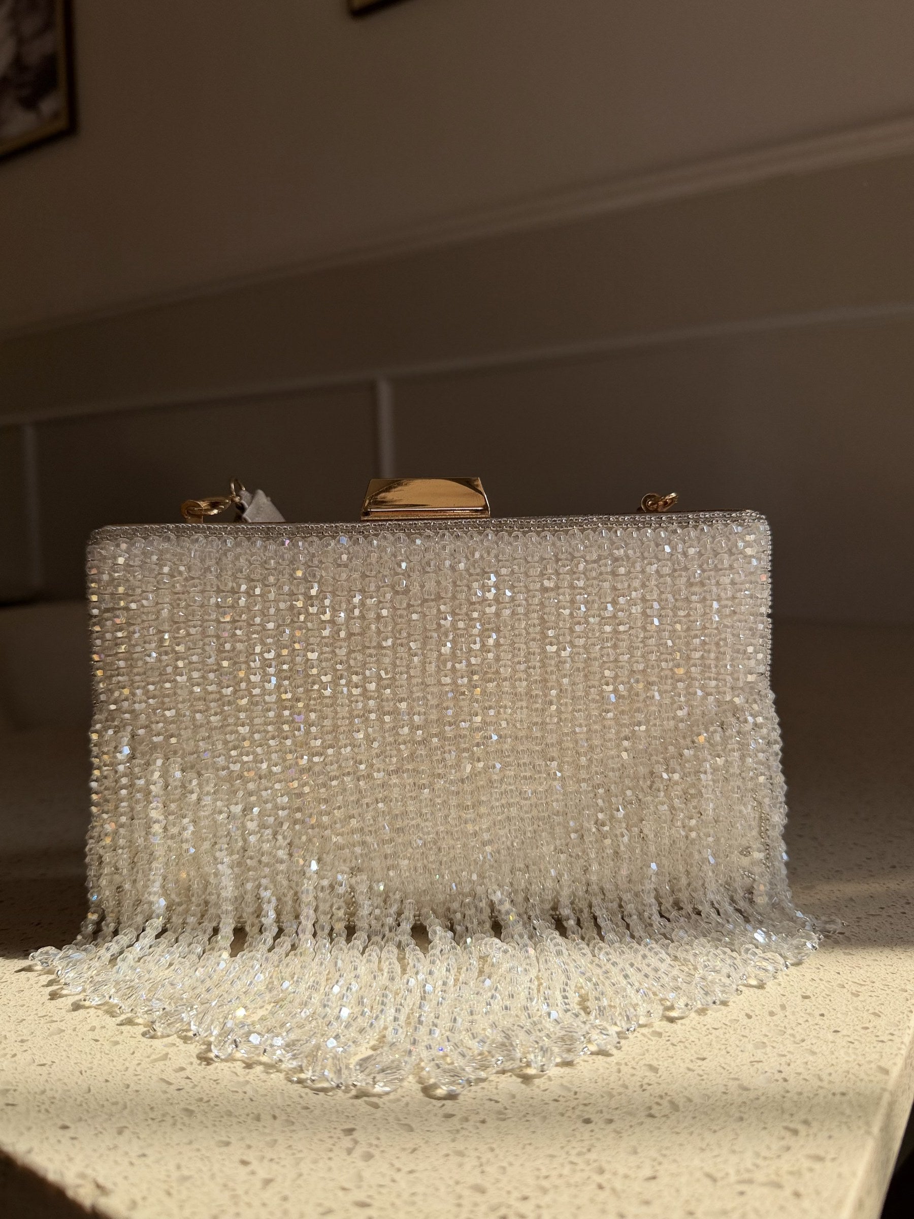Front view of the Crystal Fringe clutch, illustrating the layout of the crystal rows.