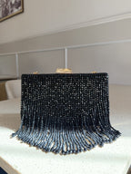 Rear view of the Crystal Fringe bag showing the clean back satin panels.