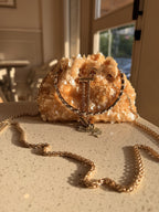 Top angle of the Disco Dust bag showcasing the metal handle and frame lock.