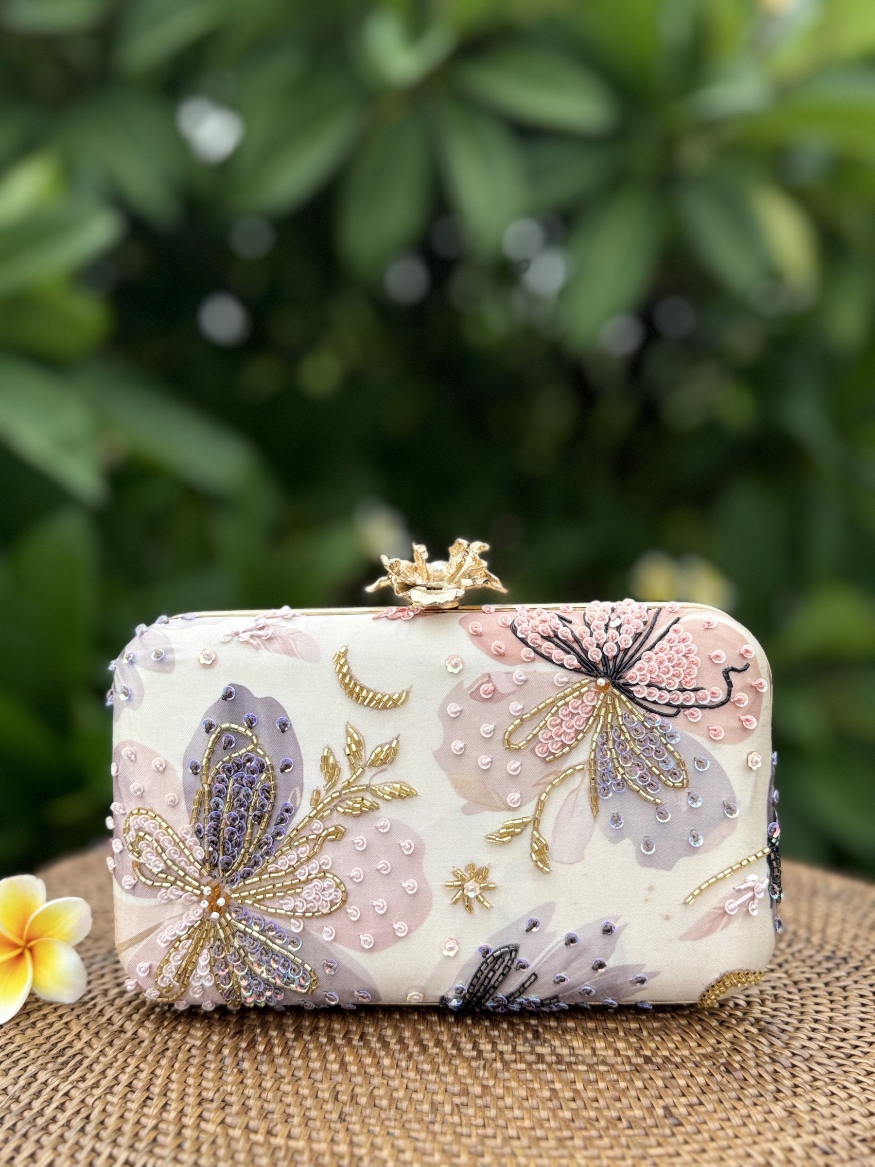 The clutch styled handheld to illustrate compact evening proportions.