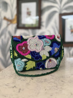 Rear view of the Flora Fiesta bag showcasing the consistent floral pattern across the back.