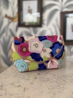 The Flora Fiesta bag styled with a floral summer dress during a brunch setting.