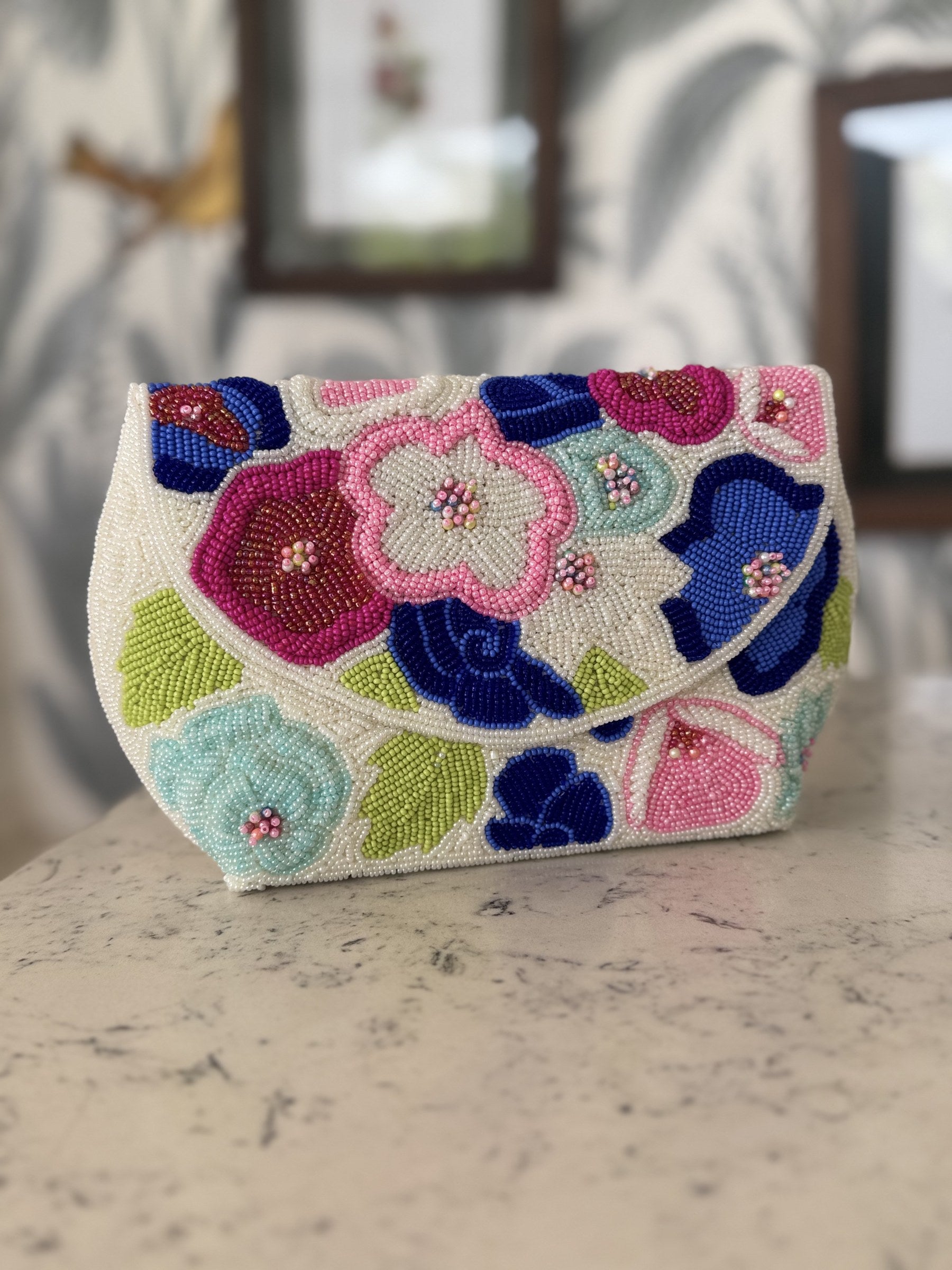 Open view of the Flora Fiesta bag showing its spacious fabric-lined main compartment.