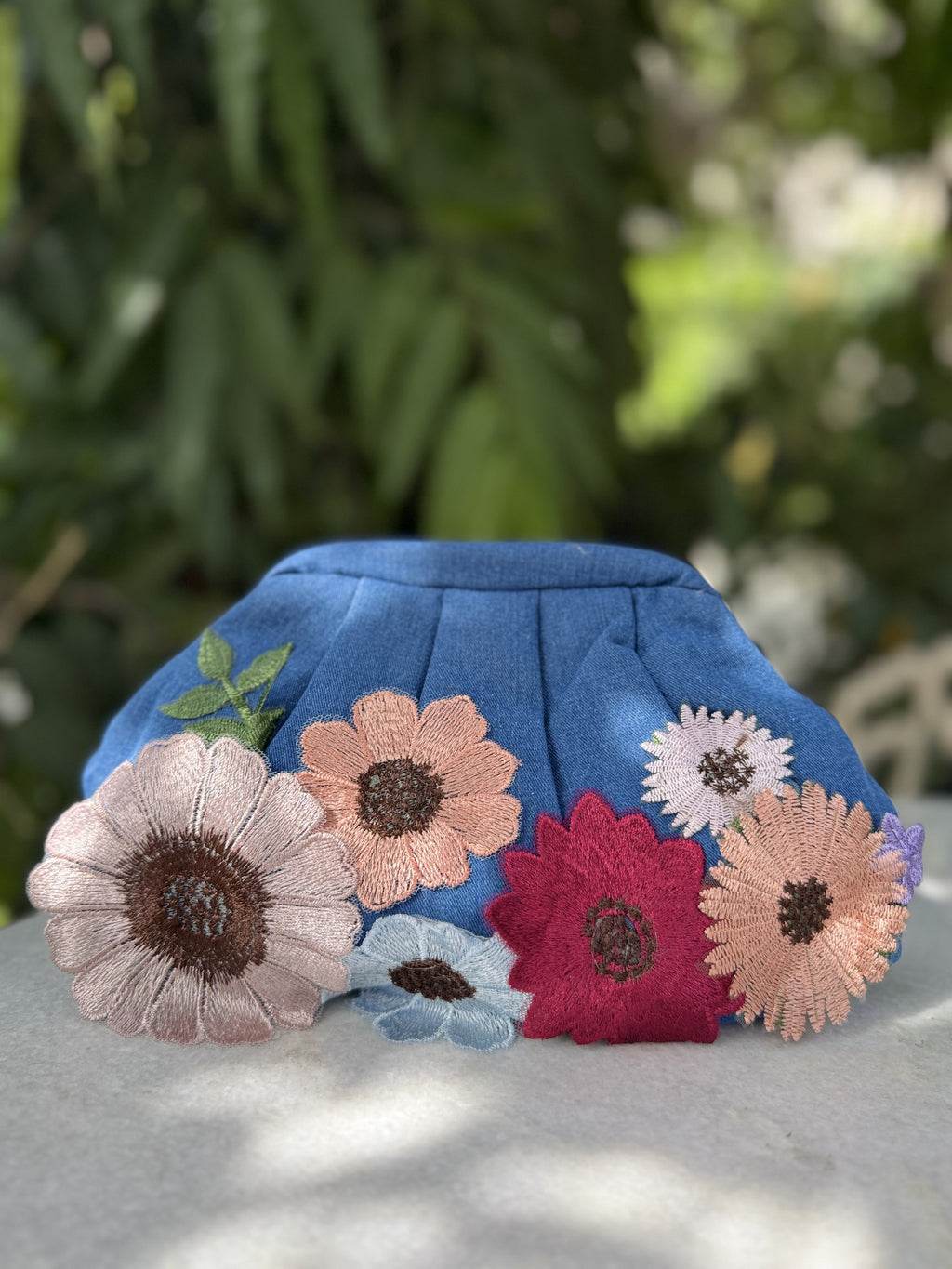 Back panel view of the Floral Feels cloud bag displaying its soft, pillowy shape.