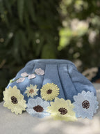 Side view showing the deep, gathered folds and high-quality fabric finish.