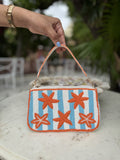 Top view of the Funky Fix bag showing the zipper closure and upgraded shoulder strap attachment.