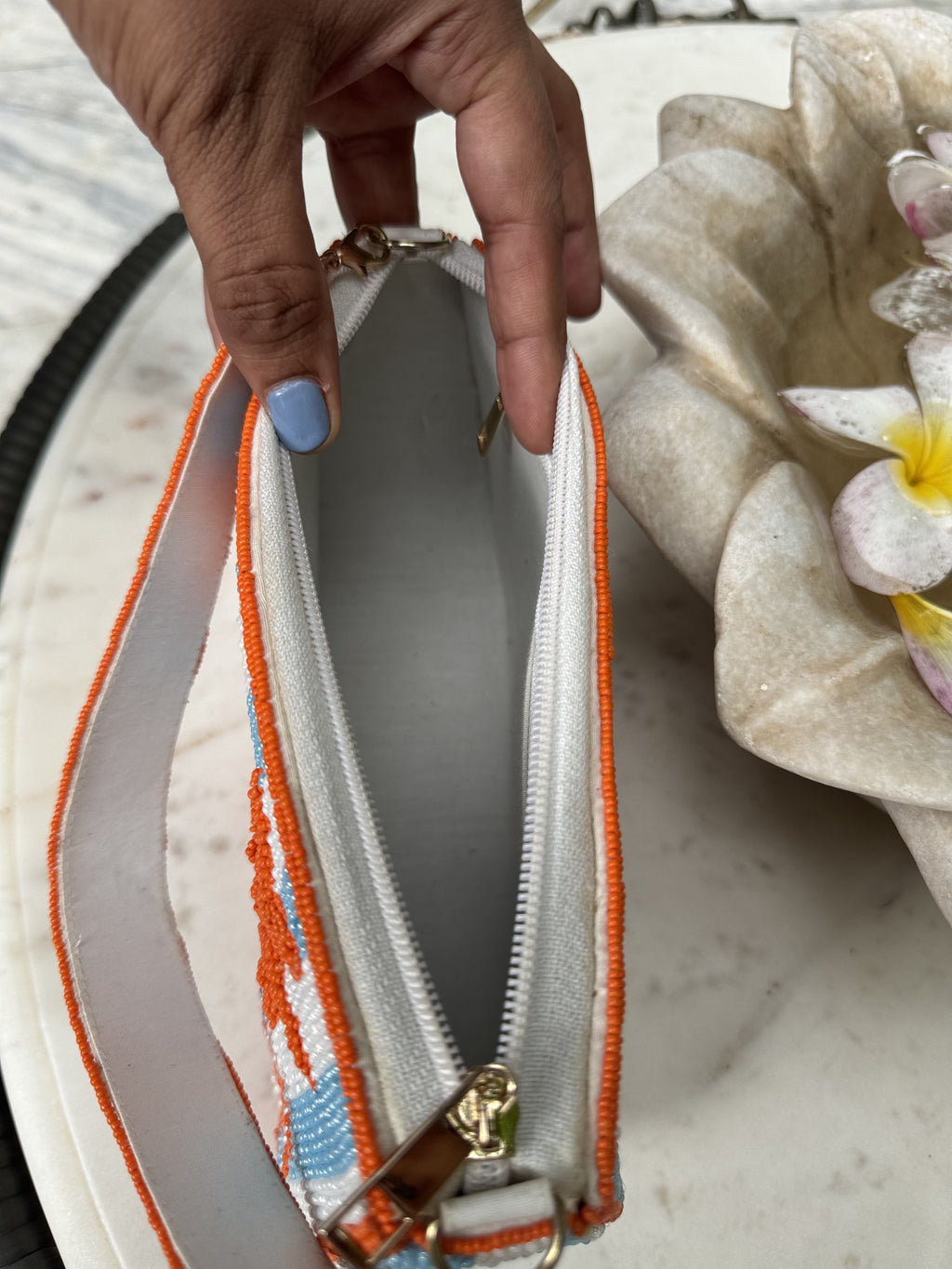 The Funky Fix bag styled on the shoulder of a model, demonstrating the 20-inch strap fit.