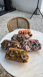 Details of the handwork showing thread color coordination.