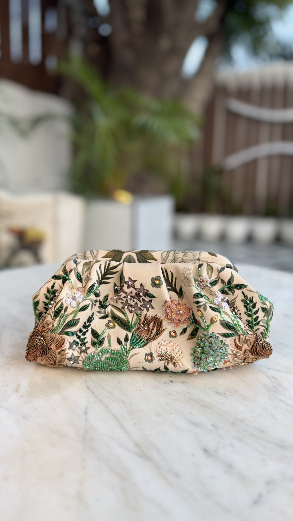 The clutch styled handheld to showcase its comfortable rectangular size.