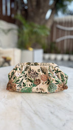 The clutch styled handheld to showcase its comfortable rectangular size.