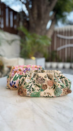 Garden Muse clutch opened, showing the roomy interior lining.
