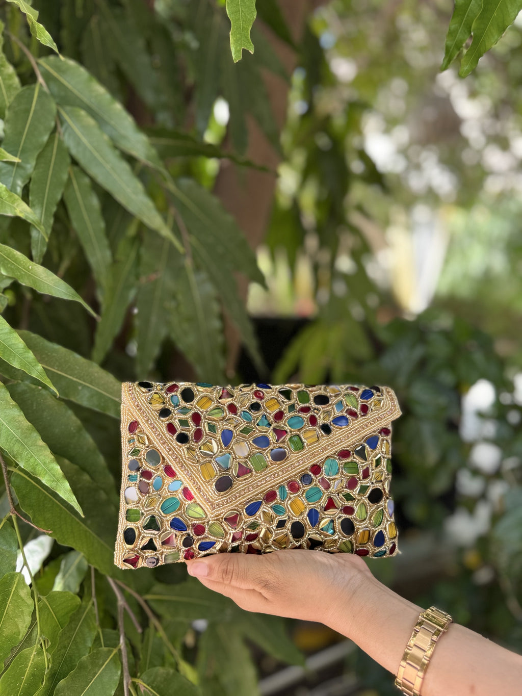 Open view of the Gemzy bag showing the spacious interior lining and secure magnetic snap button.