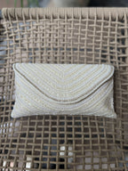 The Grainline flap bag in radiant gold, showcasing the metallic shimmer of its parallel beads.