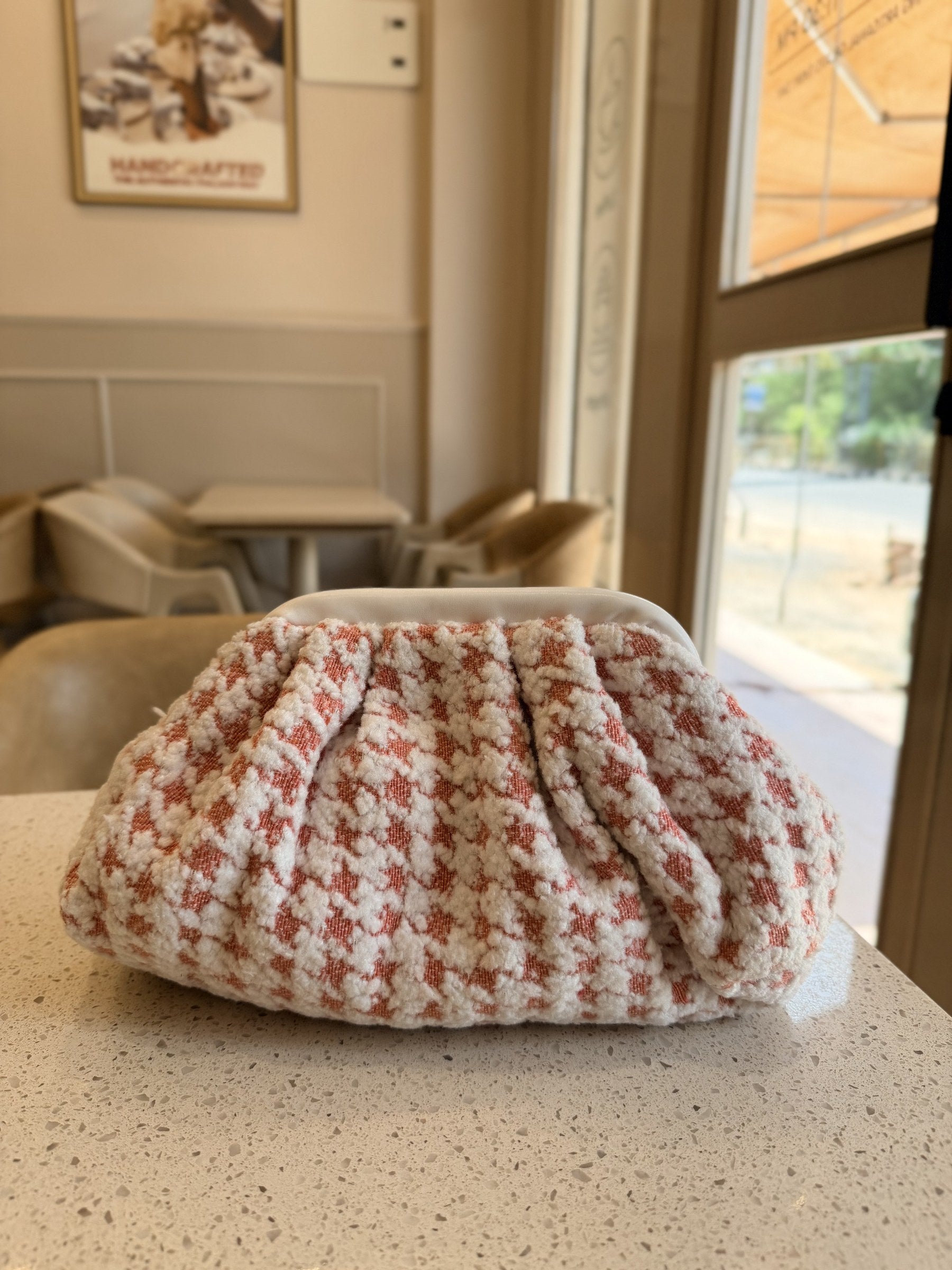 Back view of the Jacquard Cloud bag highlighting the continuous woven pattern and gather folds.
