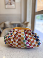 Jacquard Cloud bag styled as an underarm carry, showing comfortable sizing.