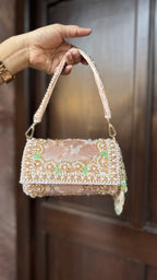 Close-up of the jadau-inspired stone and bead setting, highlighting the artisanal precision.