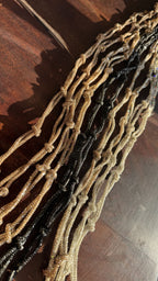 Detail shot of the woven texture and color variations on the Lanyard accessory.