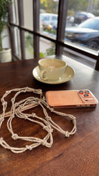 Detail of the stitching and metal hardware of the Lanyard.