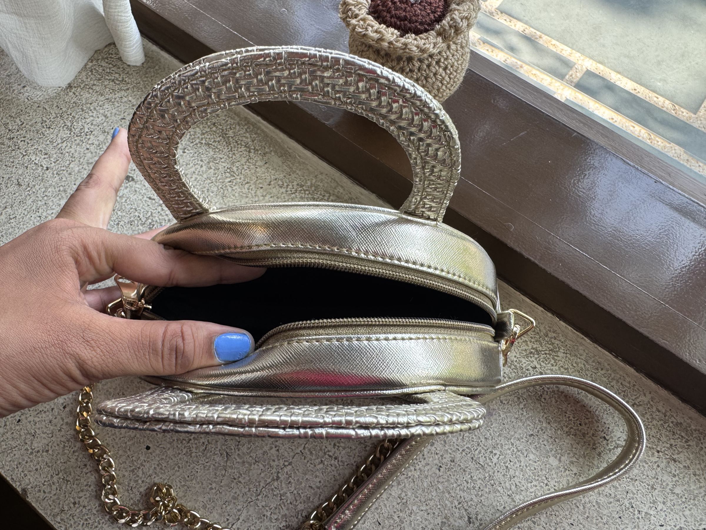 Detail shot of the fabric weave and synthetic leather trim on the Mini Mood bag.