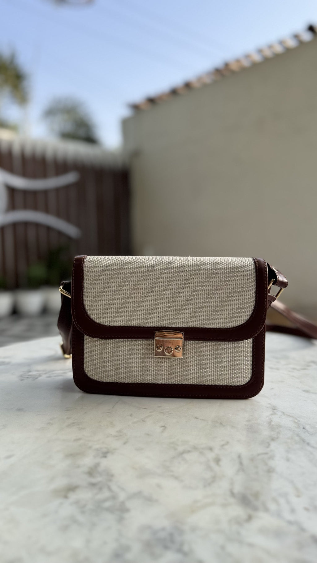 Front view of the Mocha Sling, showing the contrast between cream jute canvas and mocha-brown PU leather.