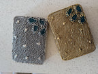 Rear view of the Molten Luxe clutch, illustrating the consistent stone work on the back.