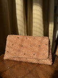 Moonbeam Crystal flap bag displaying its silver-tone crystal embellishments and short beaded handle.