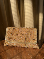 Detailed close-up of the hand-placed clear crystals and silver beads on the Moonbeam flap.