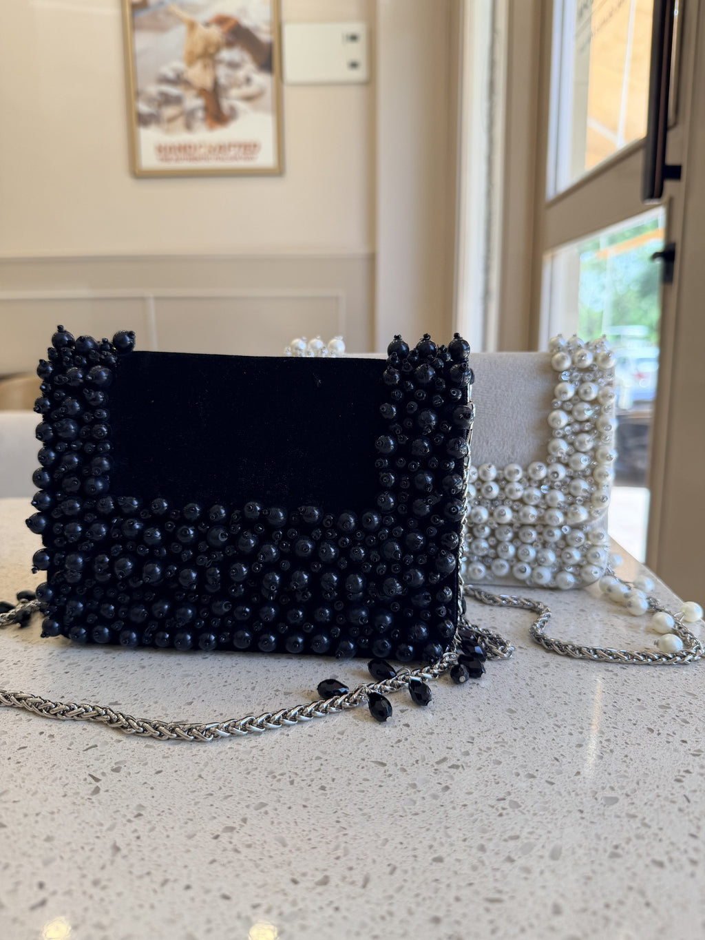 Rear panel view of the bag displaying the uniform pearl patterns on the back.