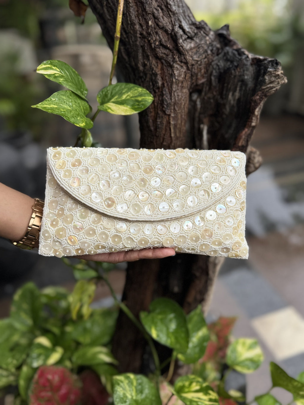 Front view of the Ocean's Grace flap bag, showing the symmetry and layout of the wave stitches.