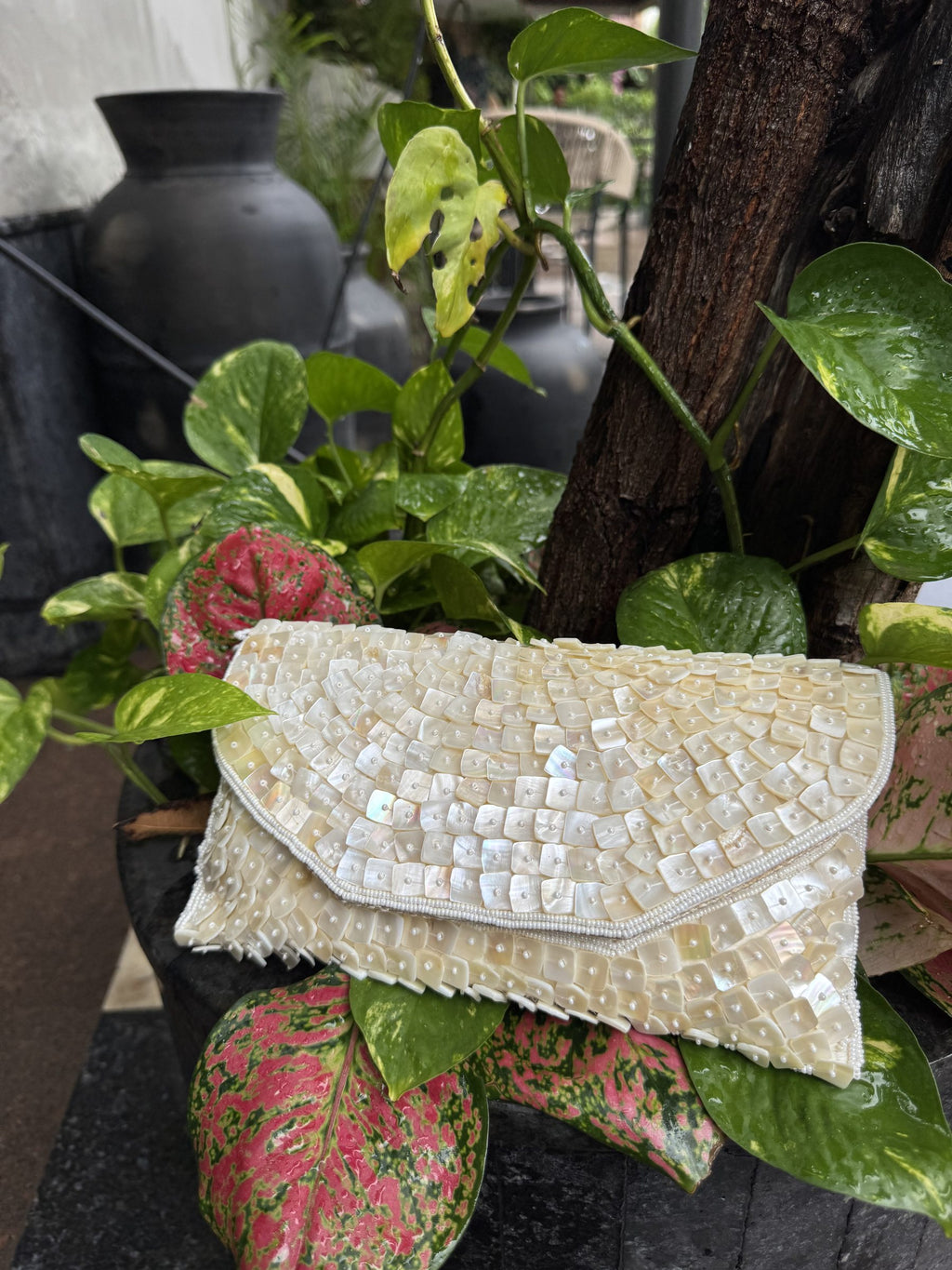 Rear view of the Ocean's Grace flap bag, showing the clean pattern coverage on the back fabric.
