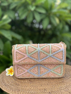 Side angle of the Pastella clutch showing its 2.5-inch depth and structural profile.