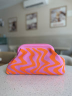 Back angle view of the Pattern Play cloud bag highlighting the spacious size.