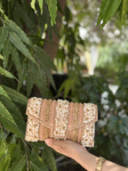 Rear view of the Riwayat bag showing the consistent coverage of embroidery on the back fabric.
